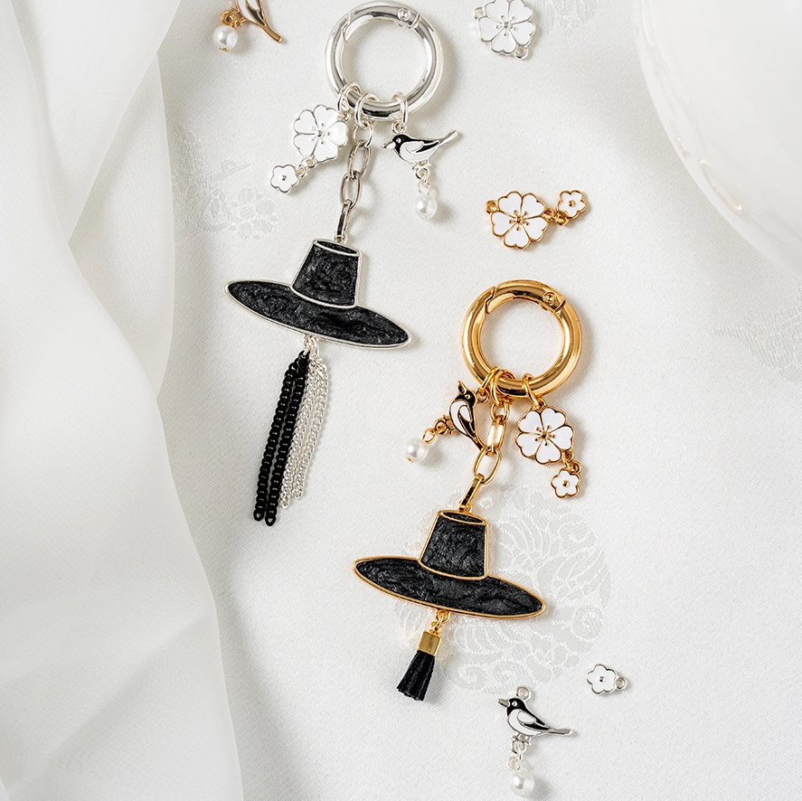 FLOWER & BIRD GAT KEYRING - COKODIVE