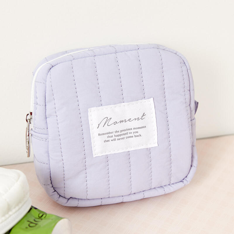 PADDING POUCH PASTEL BLUE - COKODIVE